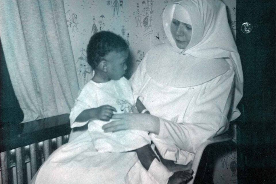 A sister with a child at St. Joesph Hospital.