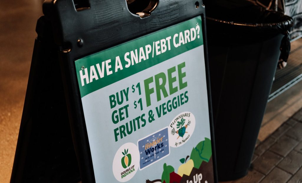 Signage for the Double Up program at Ft Wayne's Farmers Market on Dynamo Alley.