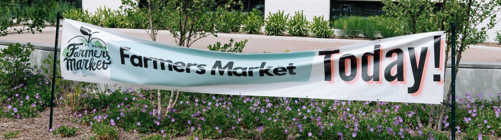 A sign for Fort Wayne's Farmers Market at Electric Works.