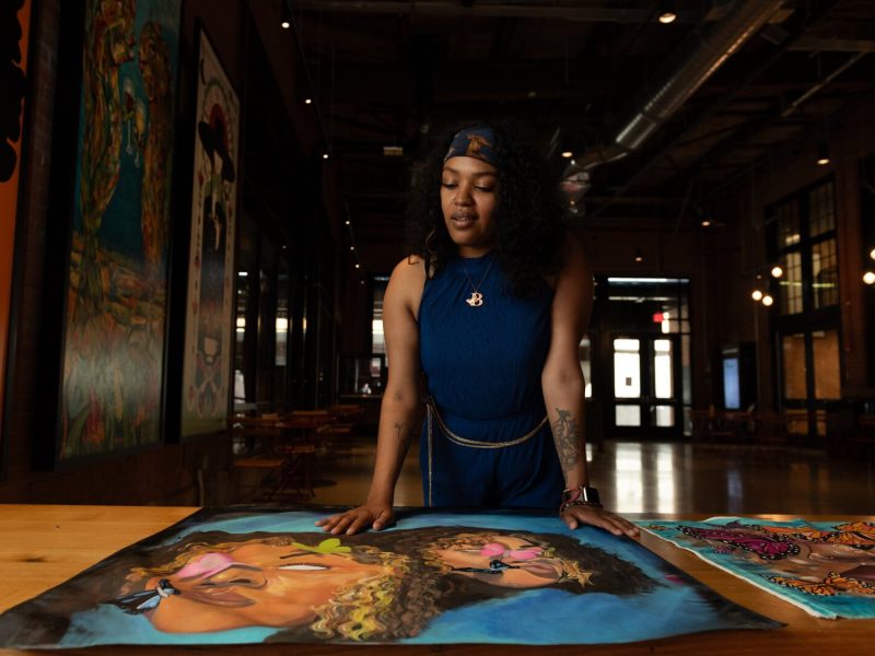 BonJo talks about her artwork at Union Street Market.