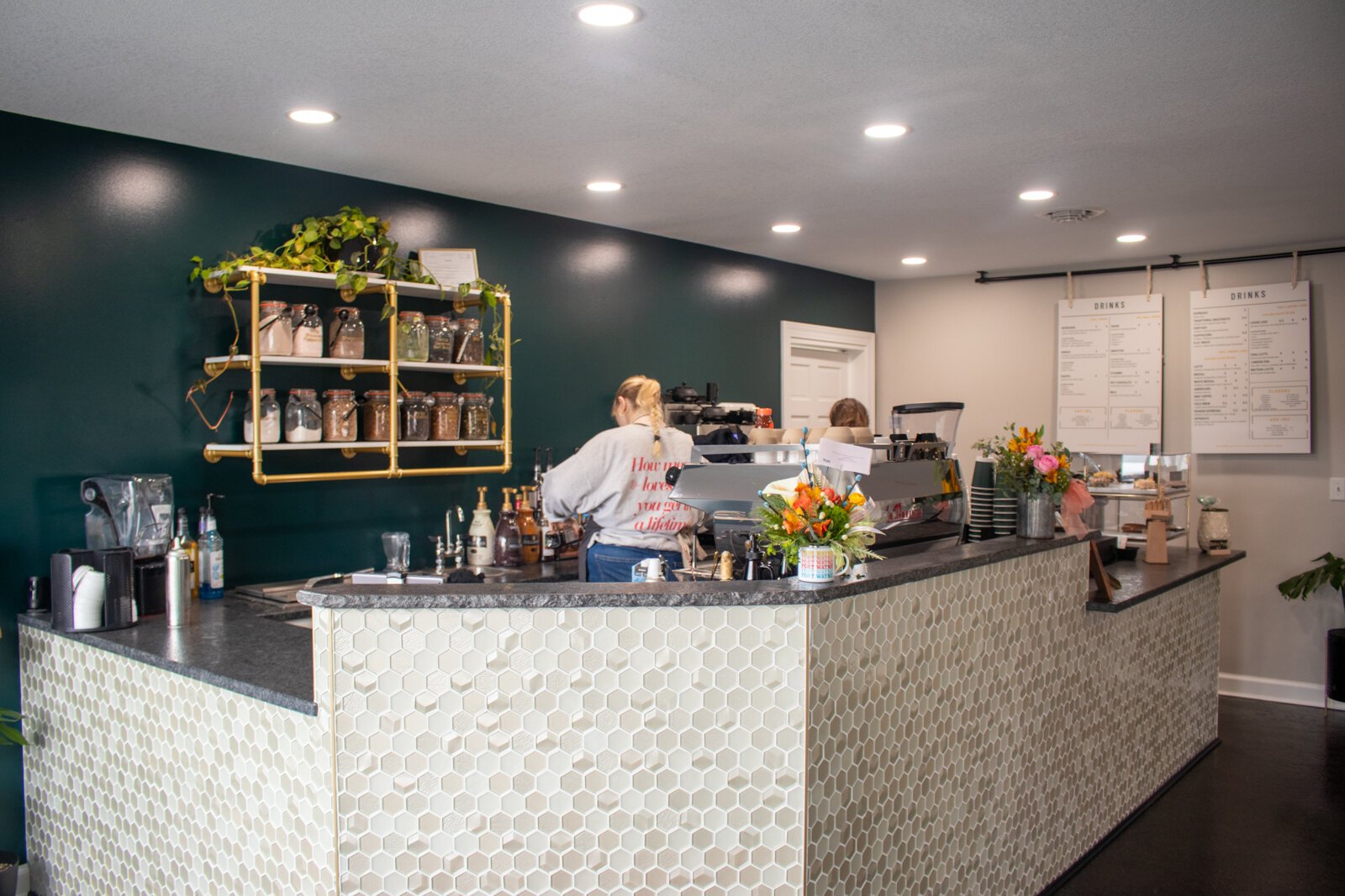 Baristas fill orders at The Hive.