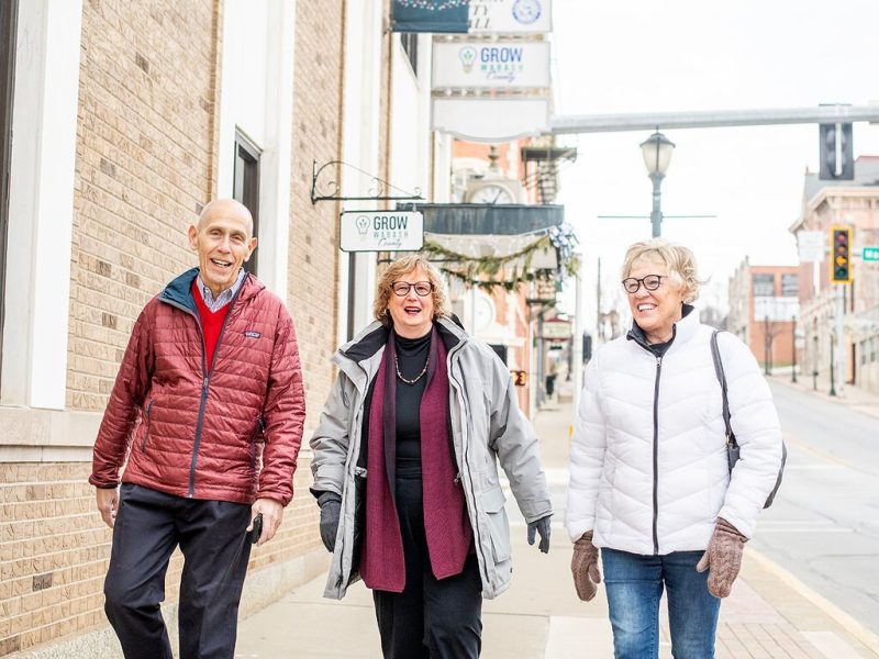 Retirees (left to right) Dave Haist, Jan Roland, and Beverly Vanderpool walk through Downtown Wabash.