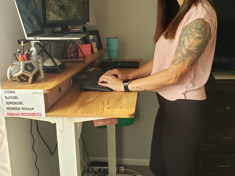 In her home office, Rhiannon uses a walking pad under her desk to help avoid sitting for long periods.