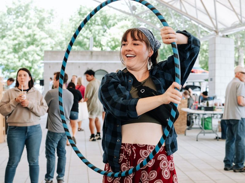 Julia Hyndman, owner of Tulip Tree Healing, hula hoops.