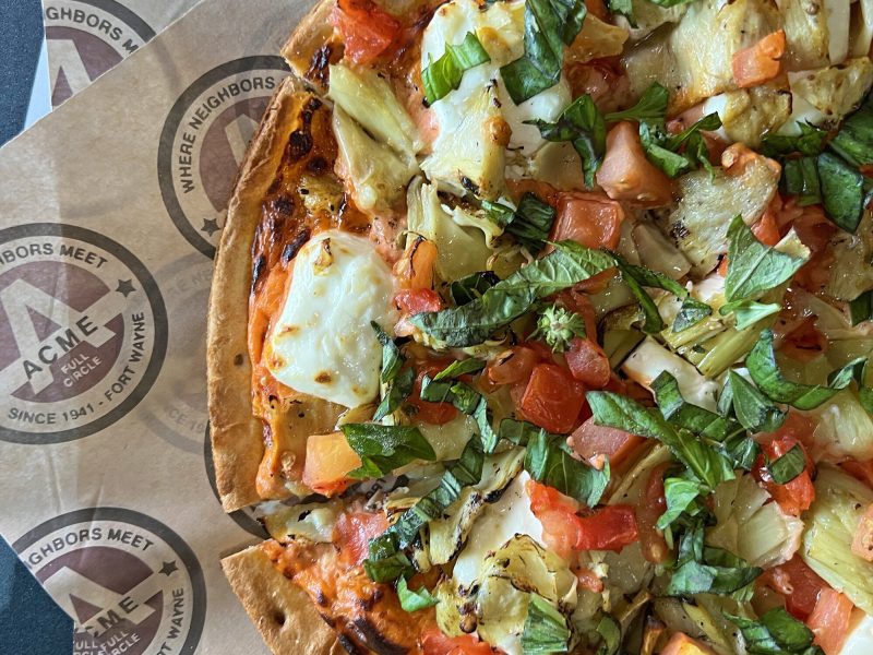 The cream cheese and garlic grilled artichoke pizza at ACME by Full Circle.