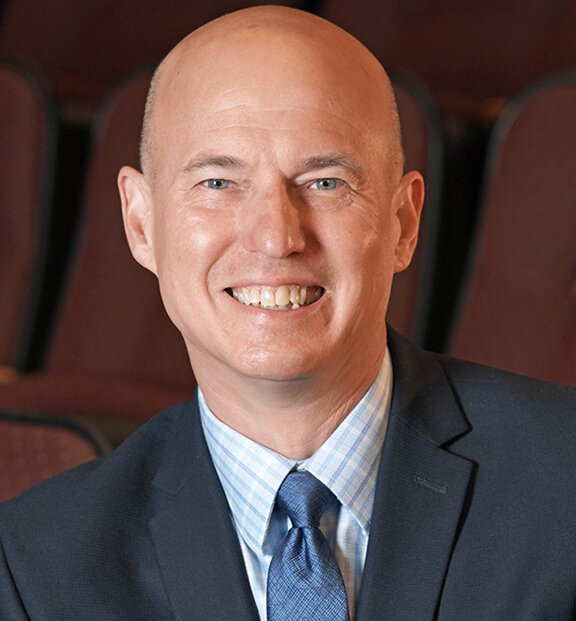 Tod Minnich, President and CEO