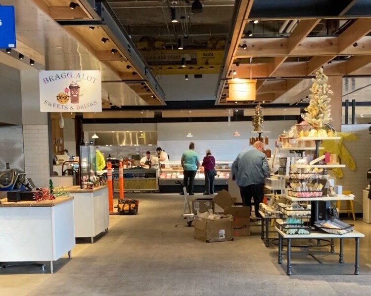 Vendors prepare for the grand opening of the Union Street Market.