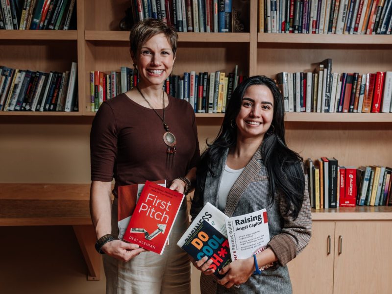 Portrait of Leslee Hill, left, Program Director and Rosalina Perez, Program Manager at WEOC Women's Business Center at the Northeast Indiana Innovation Center.