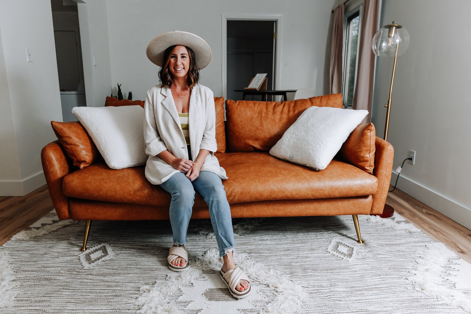 Olivia Nelson in the living room of her Airbnb, JetsetterBnb, in Fort Wayne.