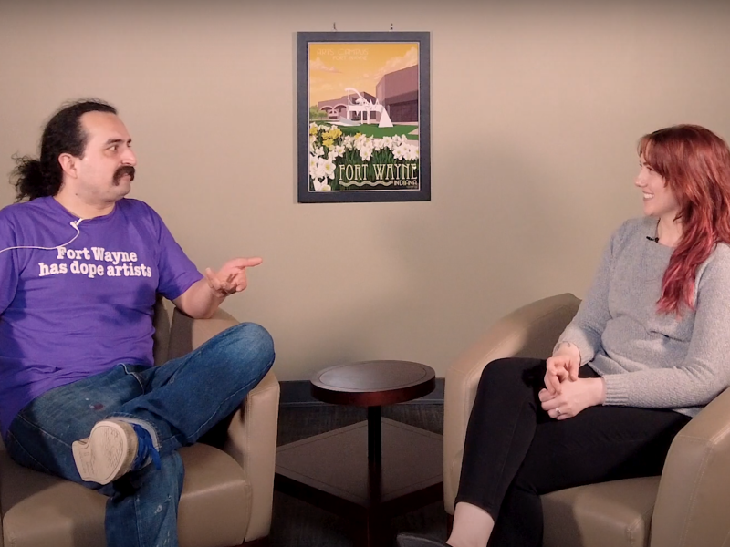 Rachelle Reinking, Director of Communications for Arts United, chats with Francisco Reyes, a local artist, about Fort Wayne Open Walls and Wrecklords events.