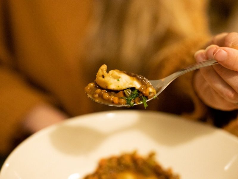 The fifth course bears a toothsome wheat berry concoction in a pool of deeply savory broth.