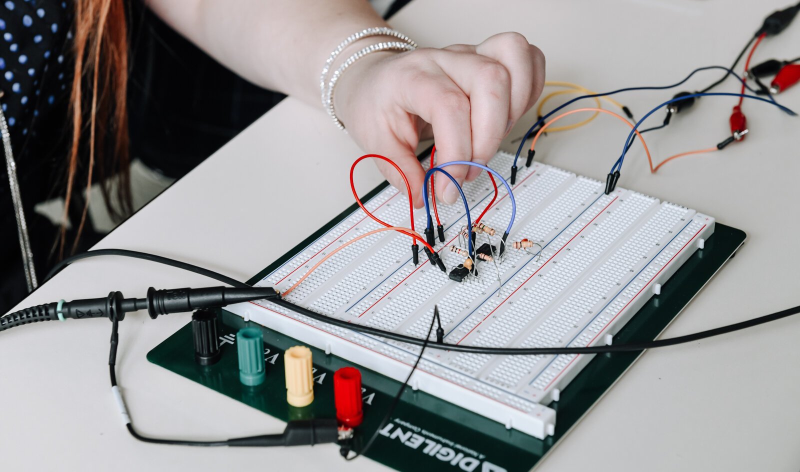 Indiana Tech student Alexandra Forsythe works on operational amplifier functions, specifically a triangle wave generator.