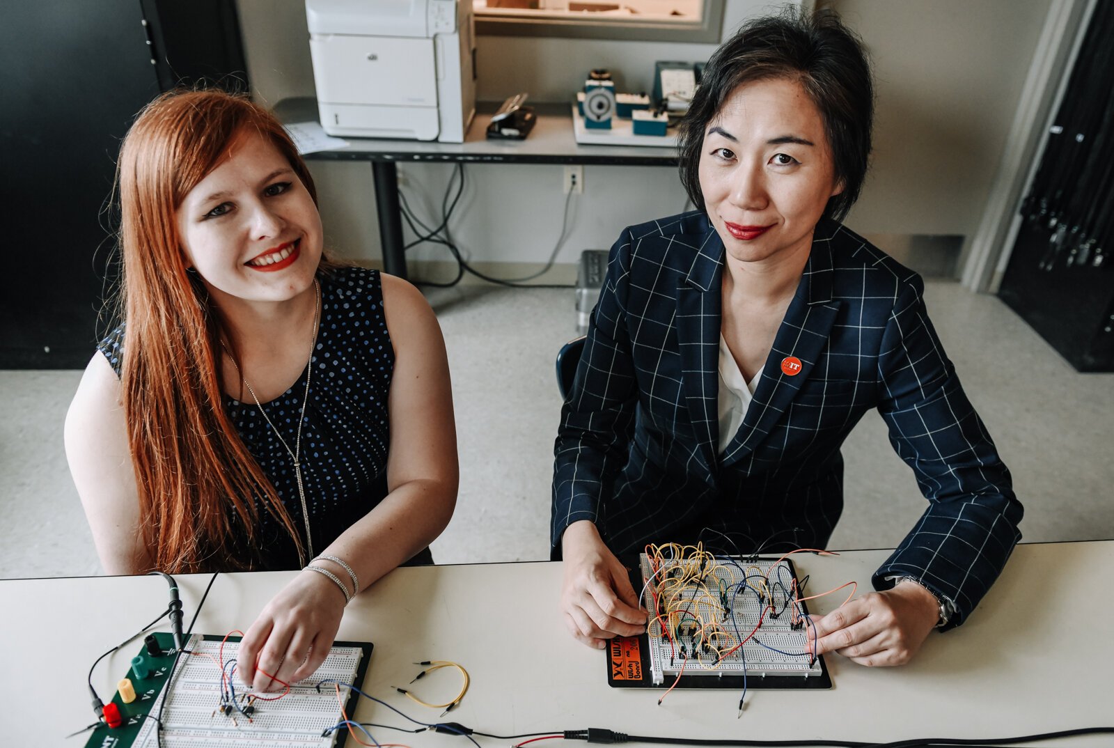 Indiana Tech student Alexandra Forsythe, left, and Dr. Ying Shang, Dean of the Talwar College of Engineering and Computer Sciences work together on operational amplifier functions.