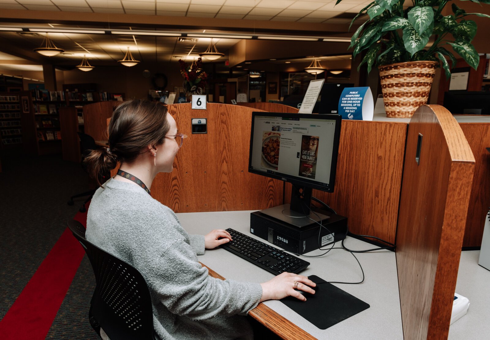 Librarian Kristina Lay uses a computer at the Allen County Public Library's Monroeville branch at 115 Main St. in Monroeville.