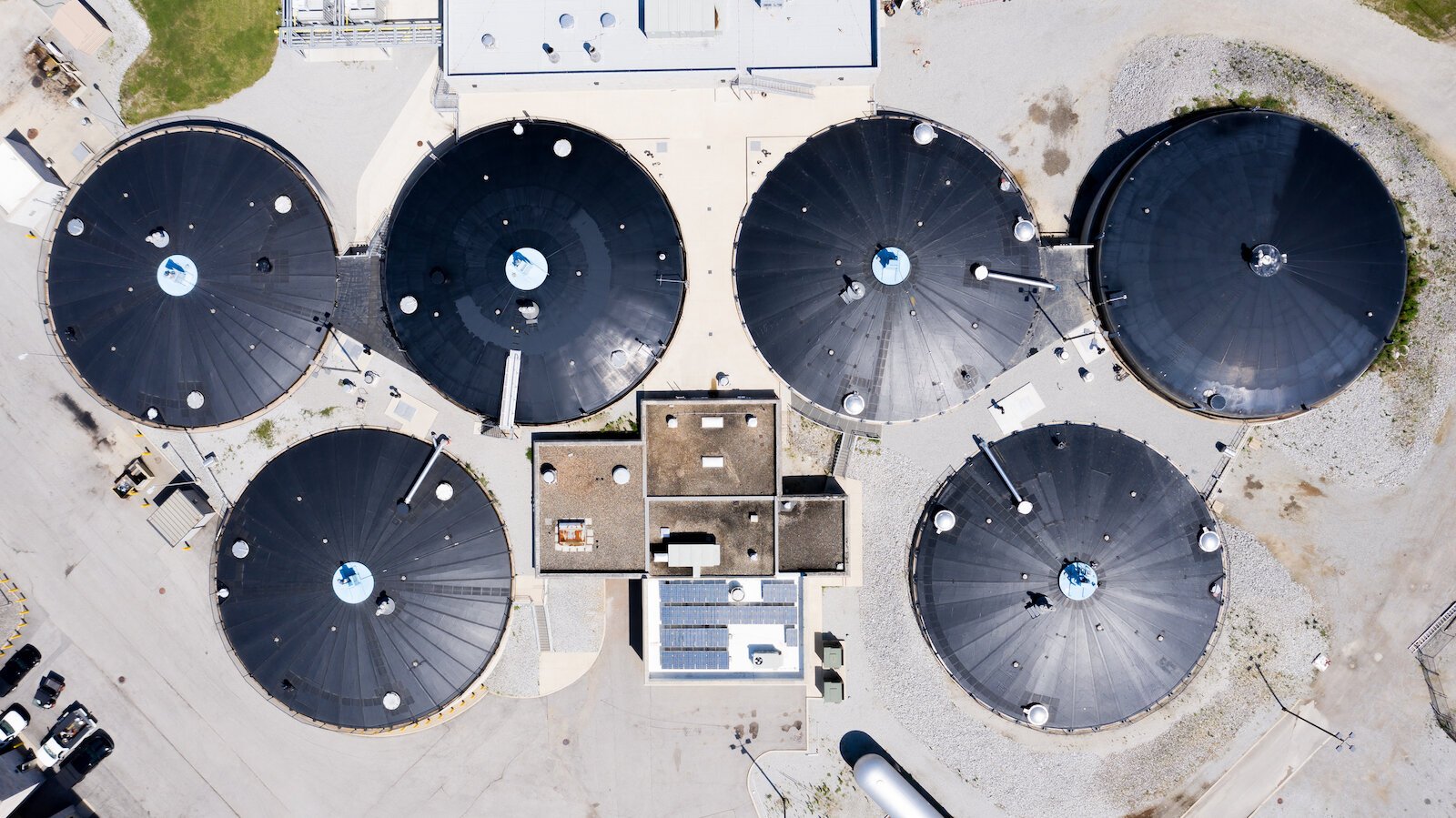 Anaerobic digesters filled with bacteria that eat waste grease and convert it to methane gas for fuel.