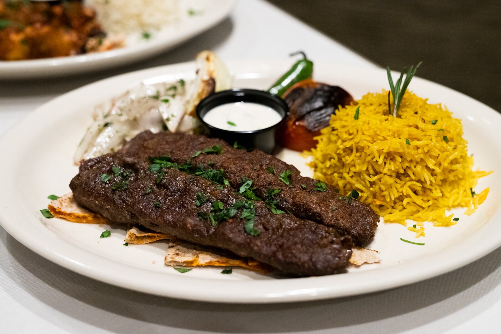 The Adana Beef Kebab is incredibly savory, tender, and well-spiced. It plays nicely with the nutty, slightly bitter tahini sauce it’s served with.