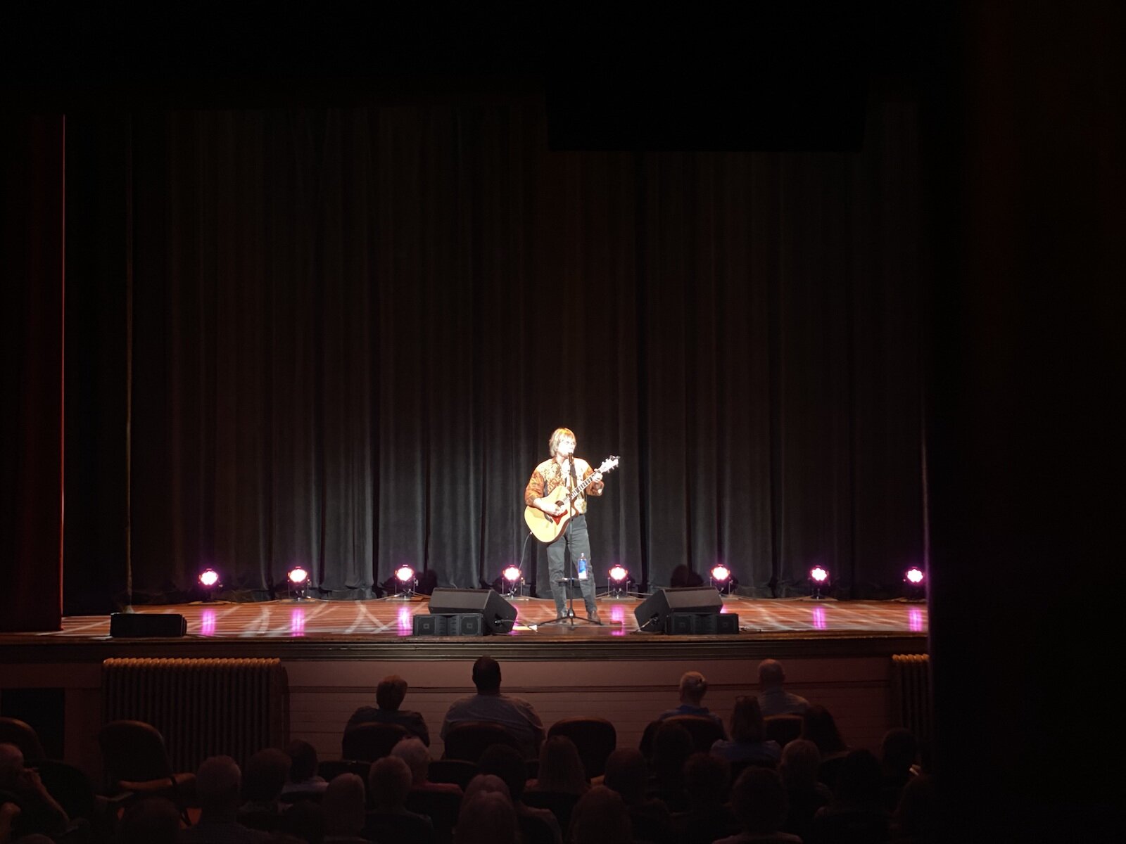 Brenden Rowan mans the lights during a production.