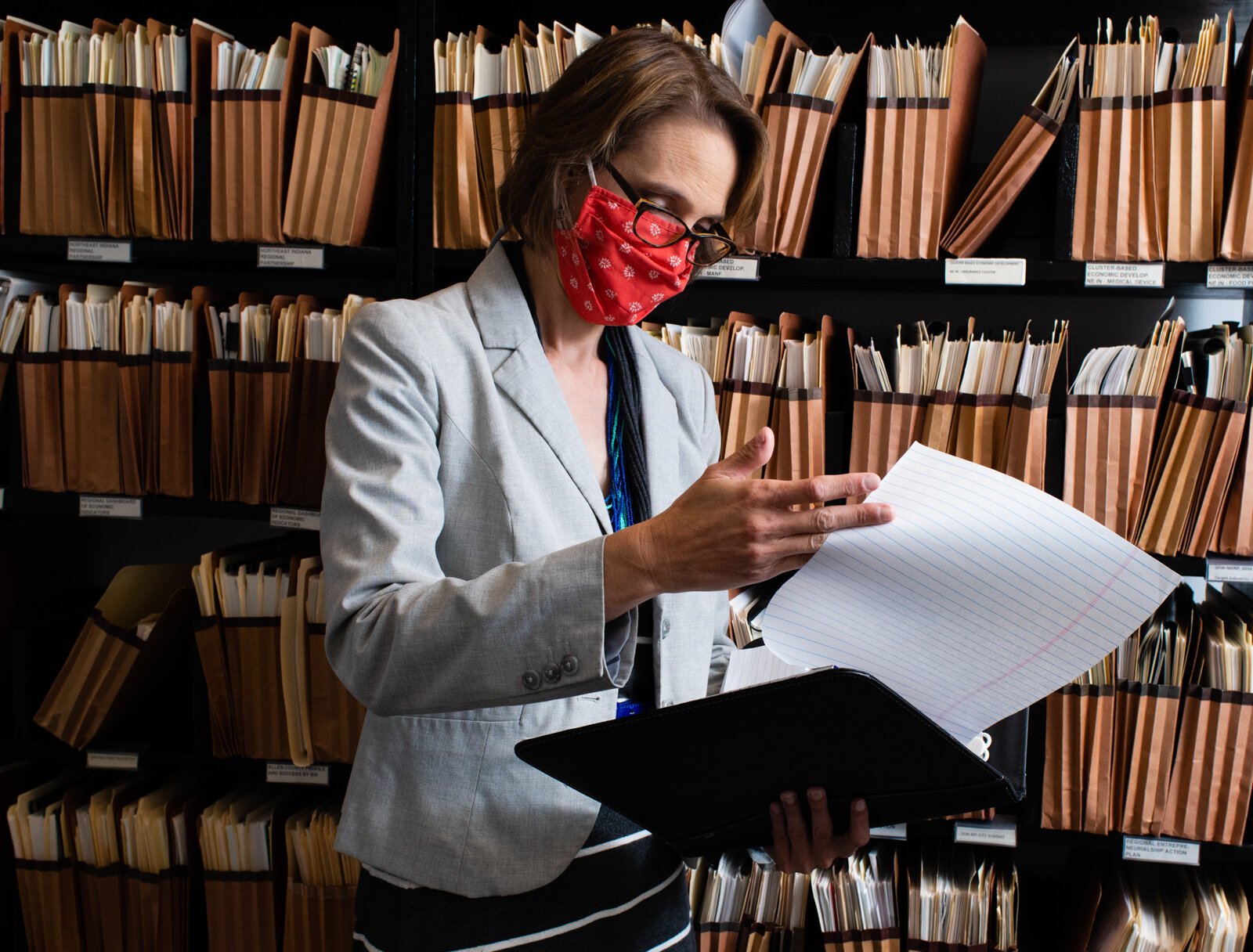 Rachel E. Blakeman, pours over data while working at her office in downtown Fort Wayne.