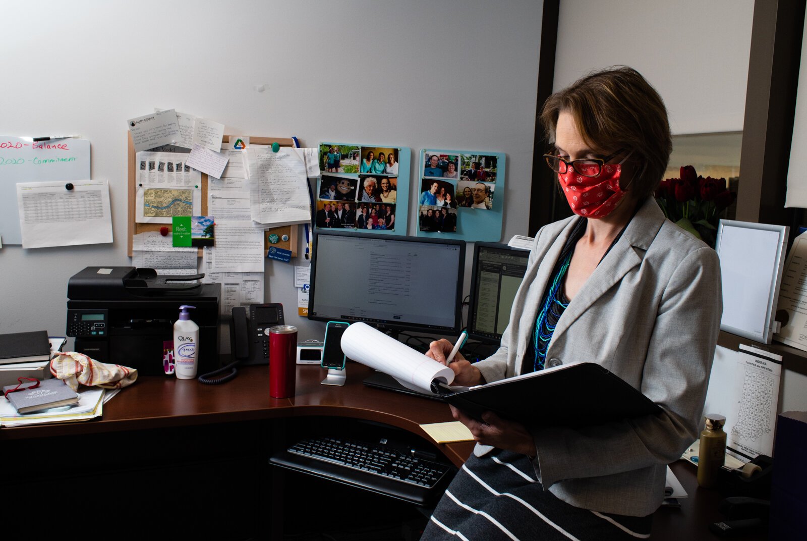 Rachel E. Blakeman, pours over data while working at her office in downtown Fort Wayne.