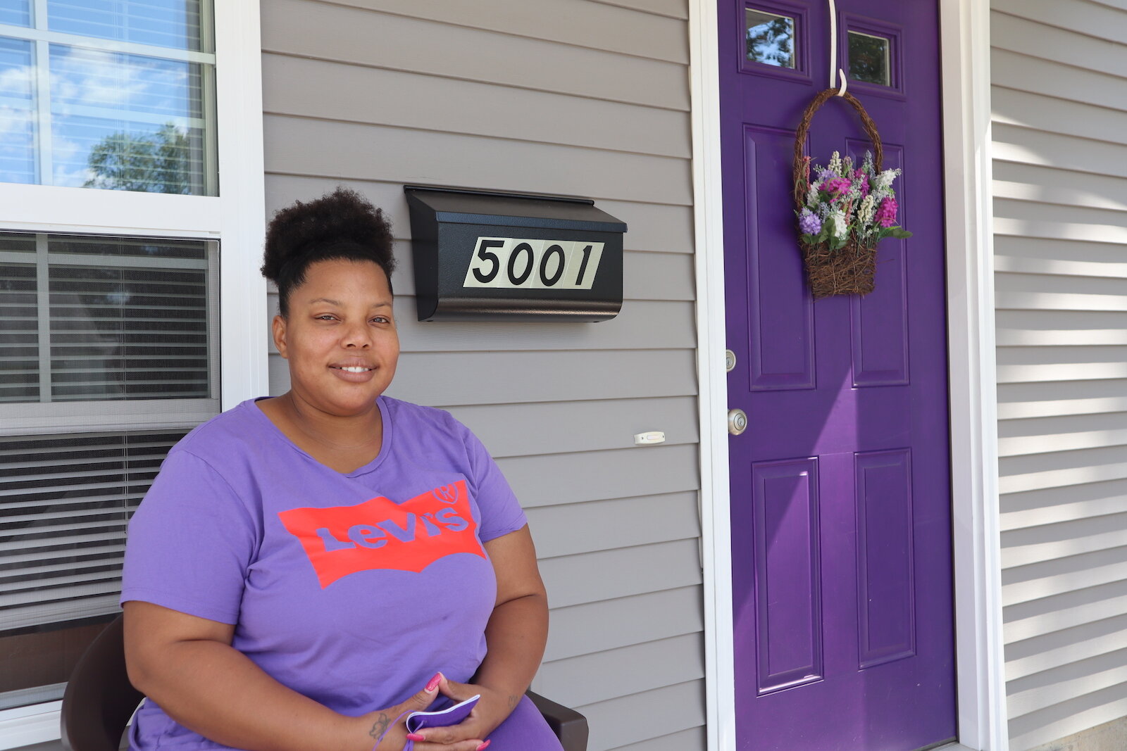 LaPria Taylor outside her new home in South East Fort Wayne.