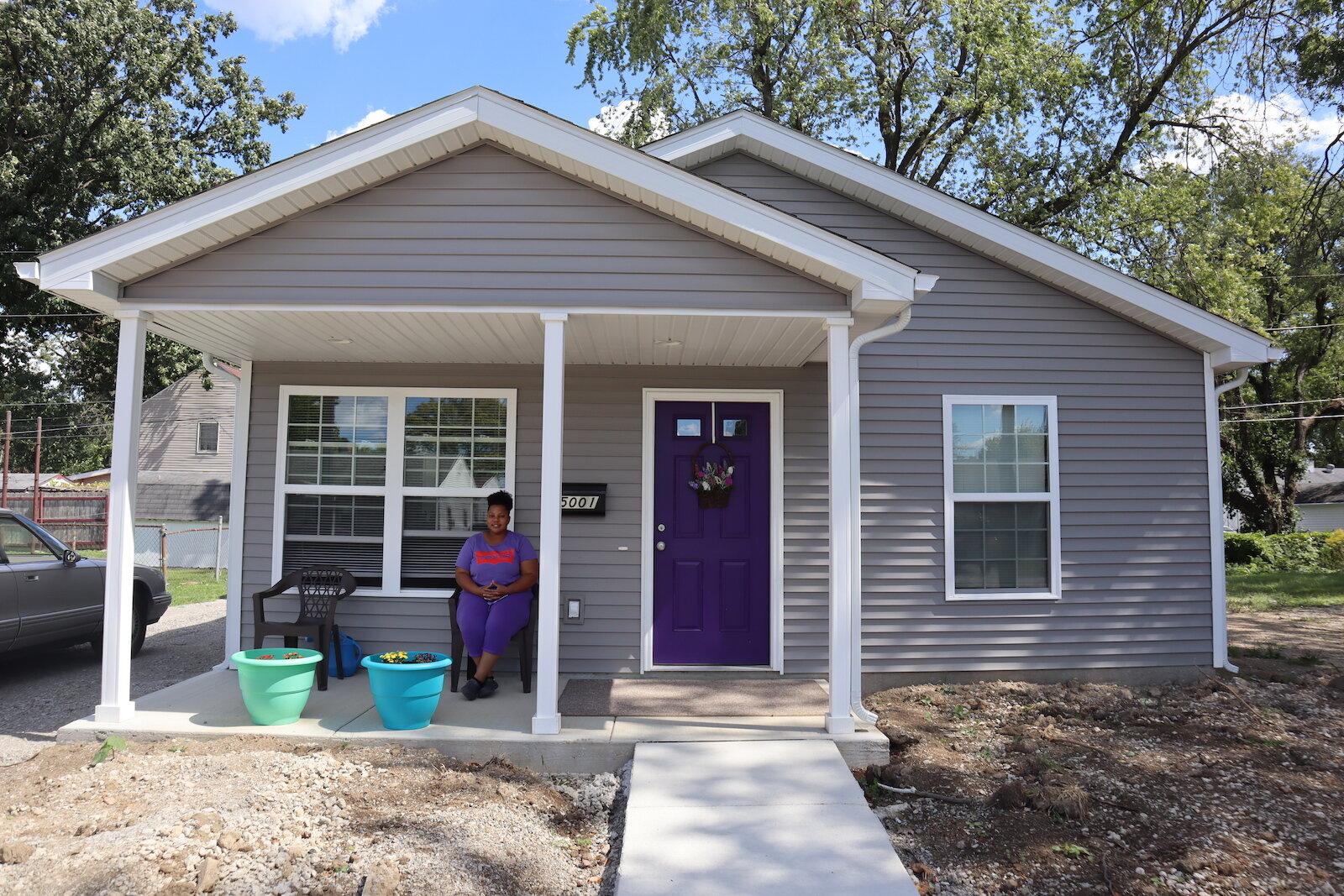 LaPria Taylor outside her new home in South East Fort Wayne.