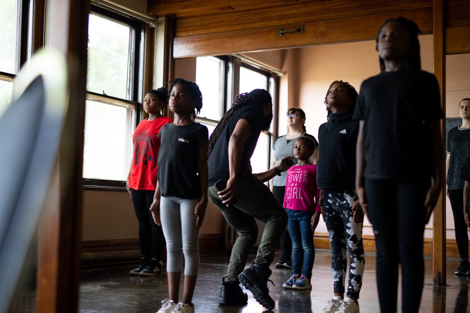 Mr. Curry says: āIf you see me on stage, and my student leaders are still tight in position, itās not because I make them hold in position. Itās because they understand the significance of being unwaveringābeing unmoved.