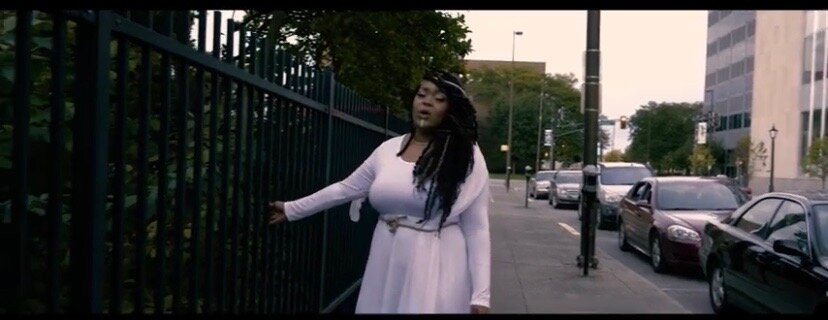 Kelly performs "SunRise" in downtown Fort Wayne.