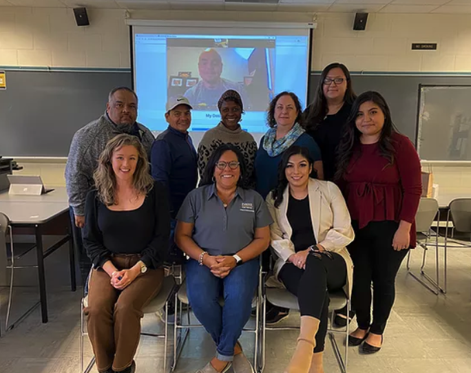 Pictured are: Back row (Left to Right): Noel Garza, Rolando Sosa, Babra Chakanyuka, Liliane Carroll, Cristina Jimenez, Yessica Lawson-Gonzalez. Front row (Left to Right): Emily Bayer, Alice Jordan-Miles (Project Director), Yanet Cordia.