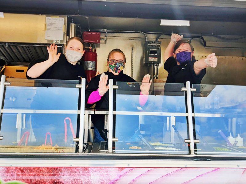 GiGi's Ambassadors Bethany Jewell and Cameron Shomo work in the Salsa Grille Food Truck.