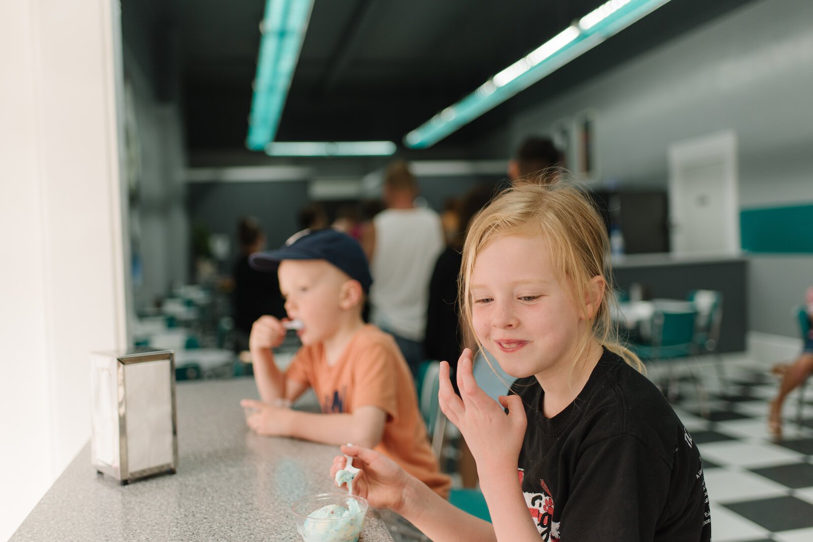 Burman's kids enjoy sweet treats at Toppings Ice Cream Parlor at 135 W. Market St.