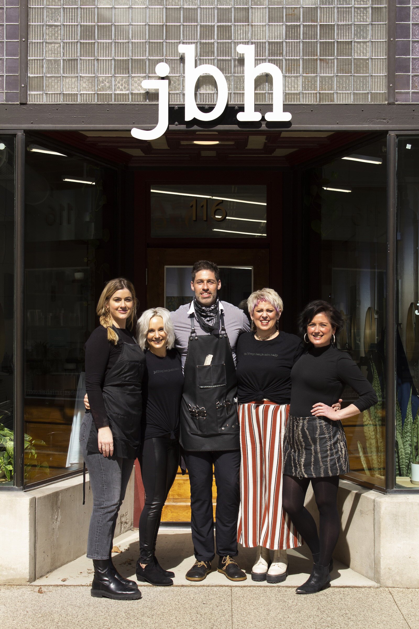 Jeffrey Ptak, center, and a team of stylists at jeffrey.benjamin.hair.