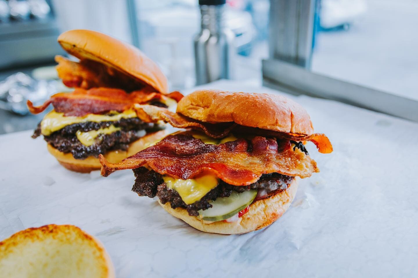 Two Truck Burgers with bacon ready to go.