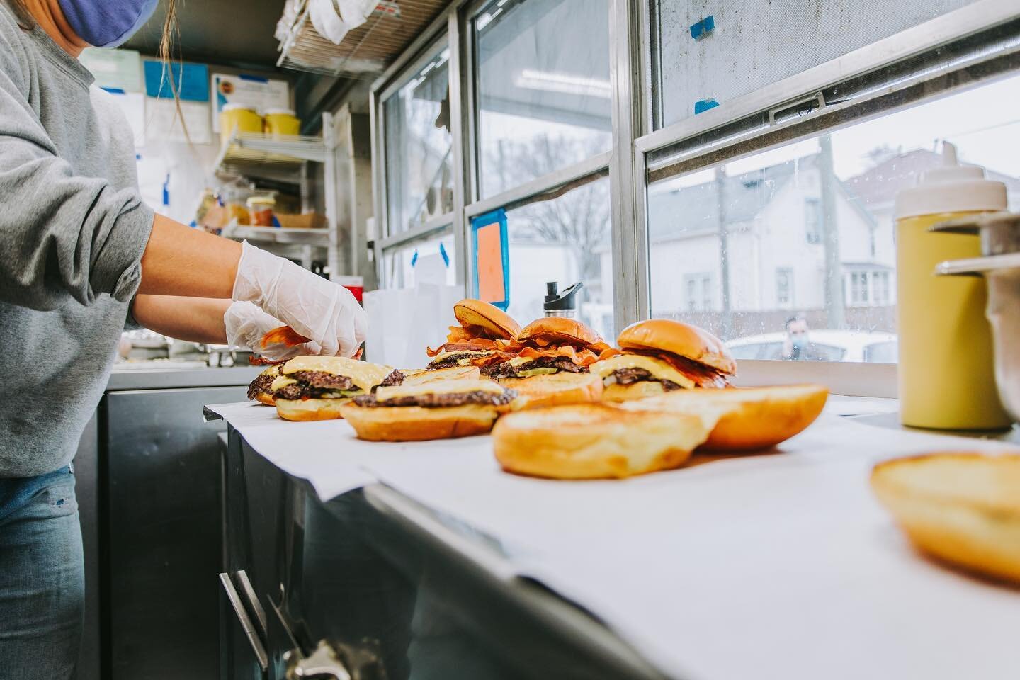 Bravas employees prep orders inside the food truck.
