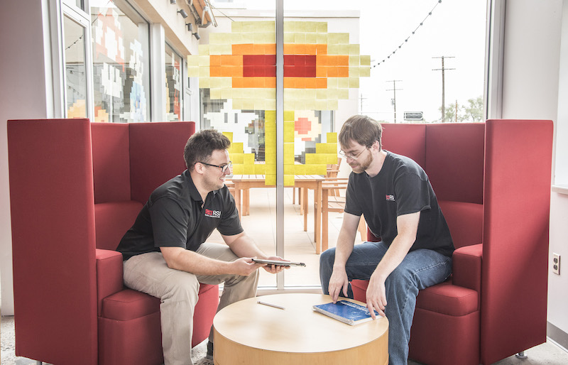 Associates in Rural Sourcing's Albuquerque office collaborate.