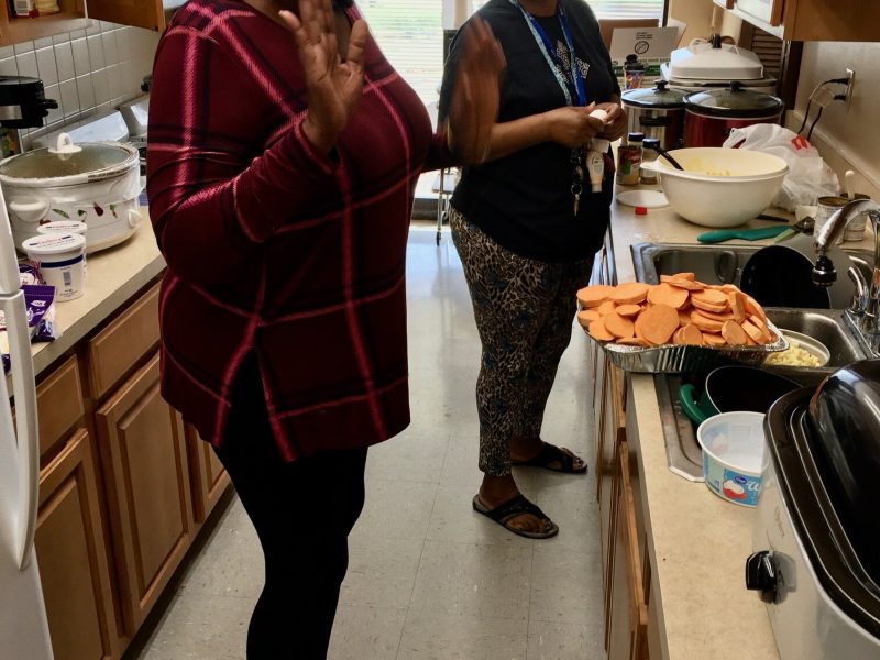 Tenant leaders at Tall Oaks Apartments give back to their fellow residents with home-cooked meals.