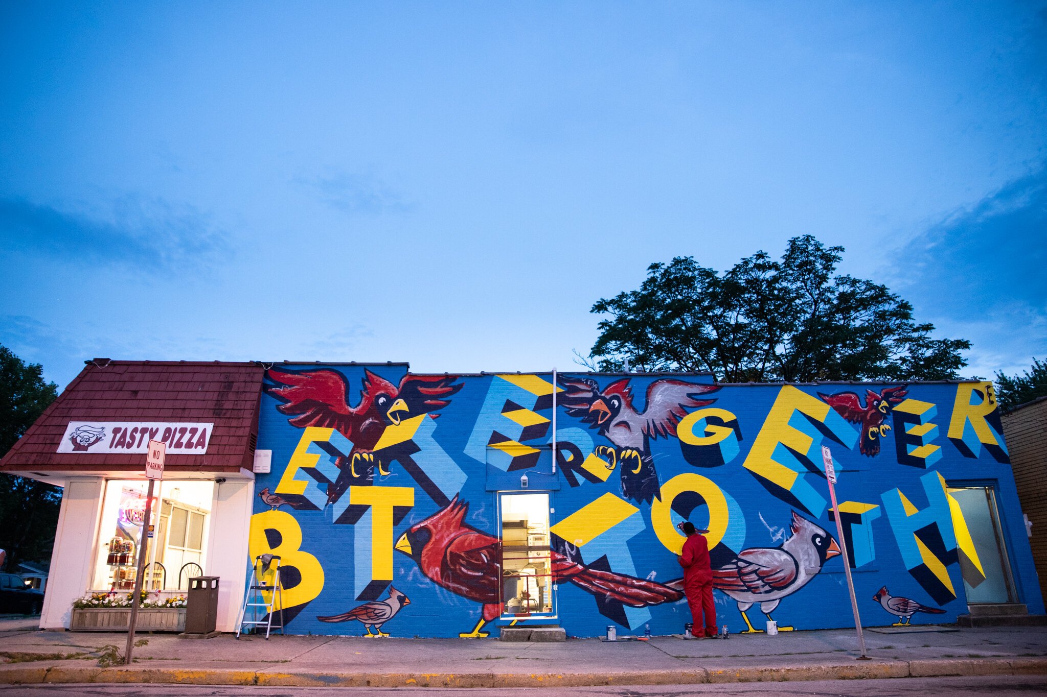 The Better Together mural by artists Theopolis Smith and Matt Plett on the side of Tasty's Pizza at 4302 Fairfield Ave.