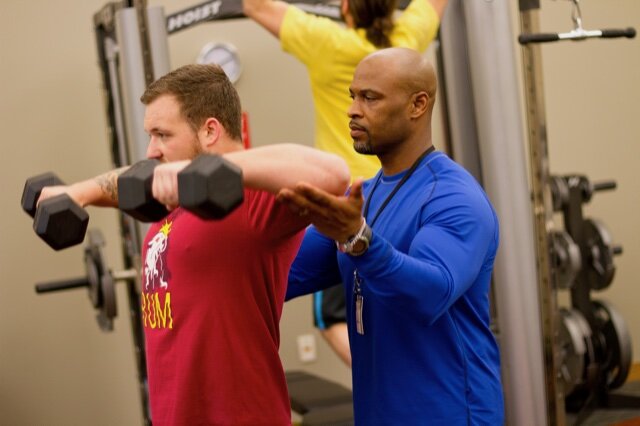 Sweetwater's Jarvis Foster helps employees achieve fitness goals.