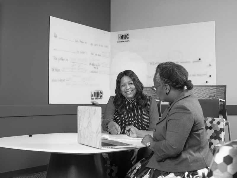 Julie Sanchez, left, coaches potential entrepreneurs at The NIIC.