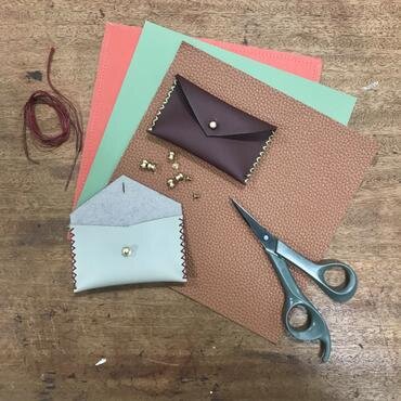 A faux leather mini clutch at-home workshop by The Hedge.