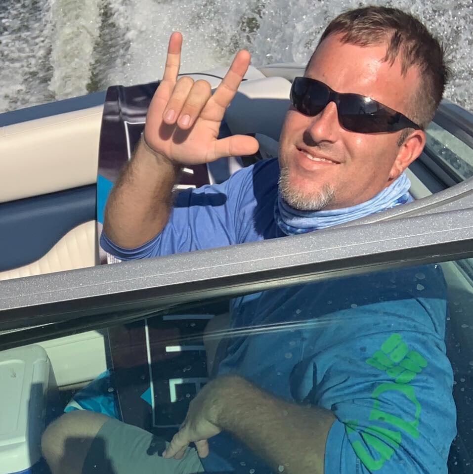 Drew Shipley's family and friends copy the "I love you" sign he sent his wife before passing.