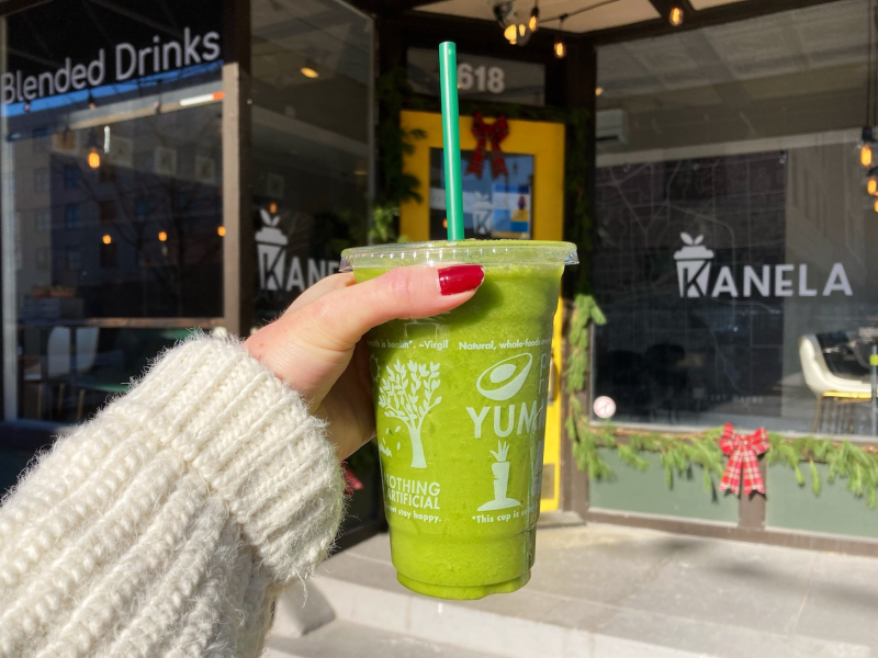 A Drink Your Veggies smoothie at Kanela, featuring pineapple, mango, spinach, parsley, and celery.