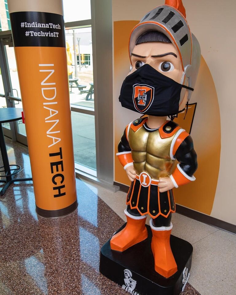 The Indiana Tech Warrior dons a mask.