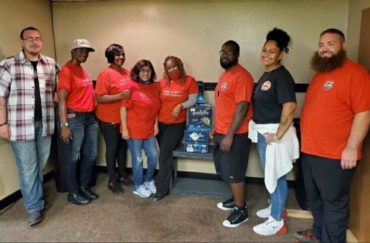 Soto, second from right, and other volunteers serve Fort Wayne's community.