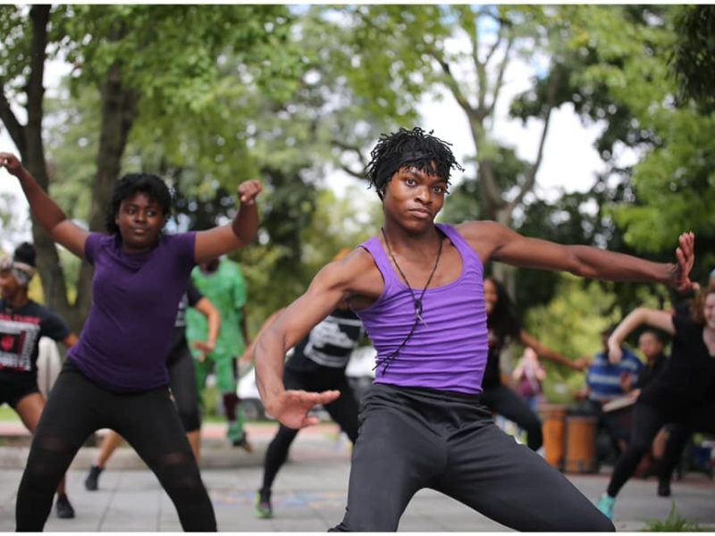 African dancers perform at a pop-up event in Bloomington in 2019 designed to restore cultural memory about a Black marketplace that was firebombed by the KKK.