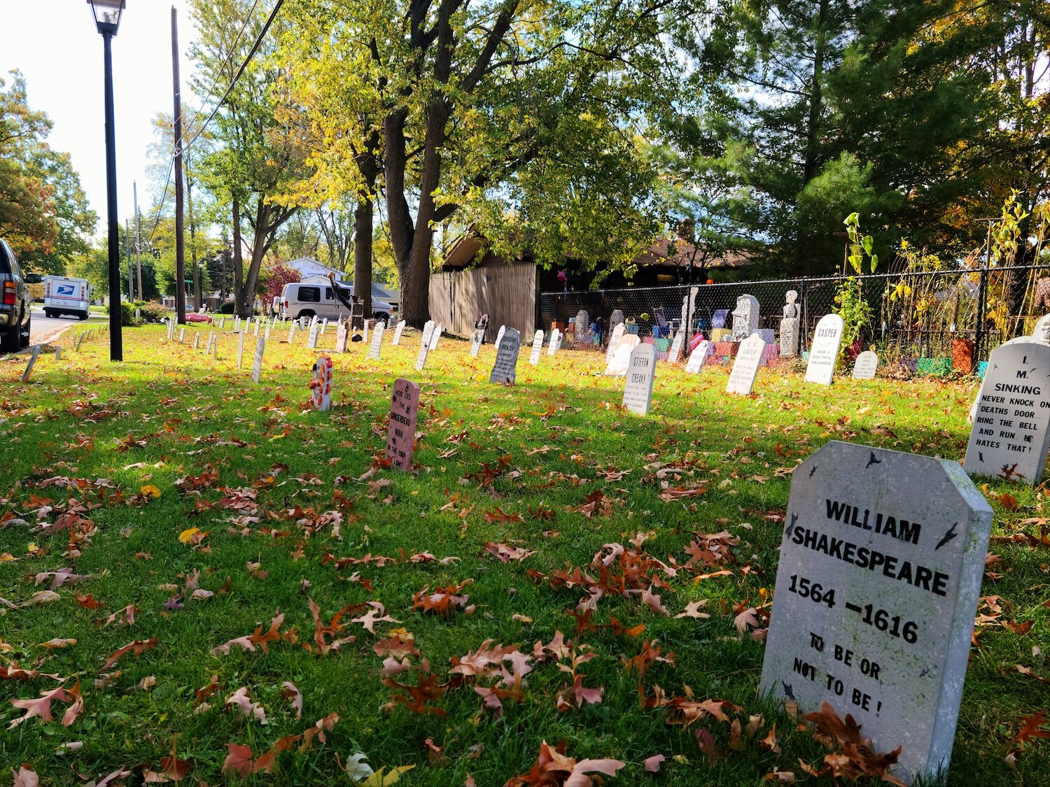 Tombstones in Morse's yard play off politicians and historical figures like William Shakespeare.