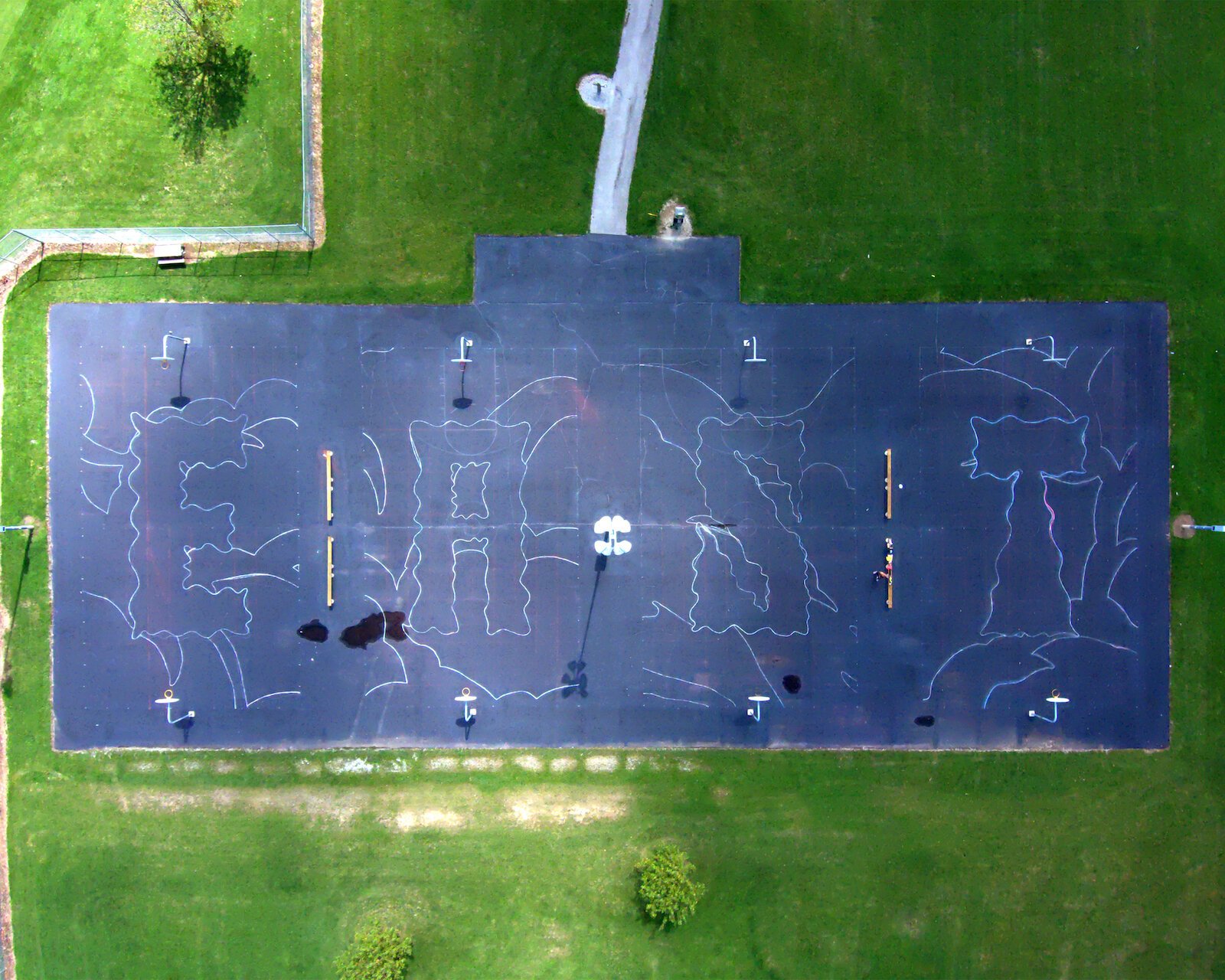 Before painting, Portee and his team at AbsorbALL sketched the design on the court.