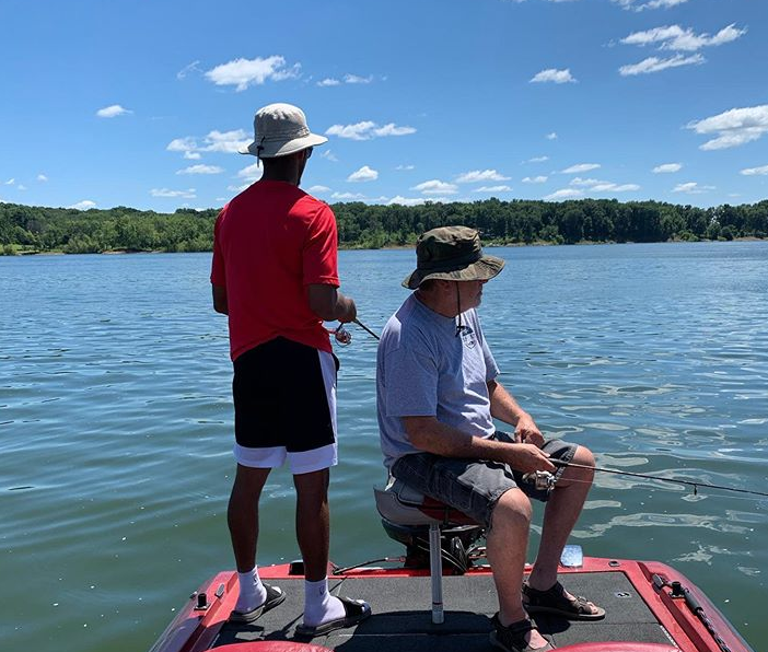 Gill and his grandpa enjoy a day on the water.