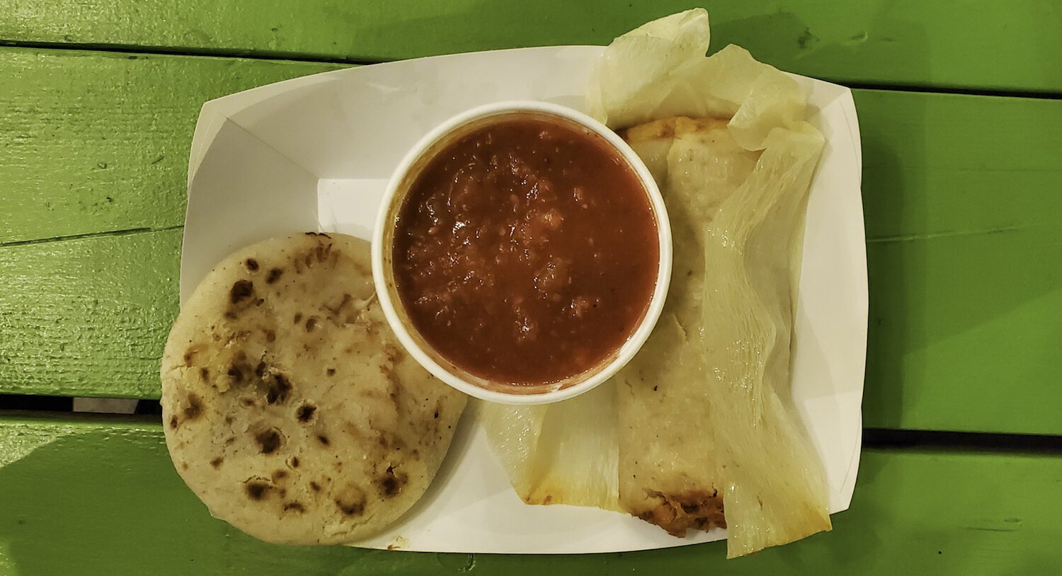 Pupusa, salsa, and tamales by RoKo's Kitchen.