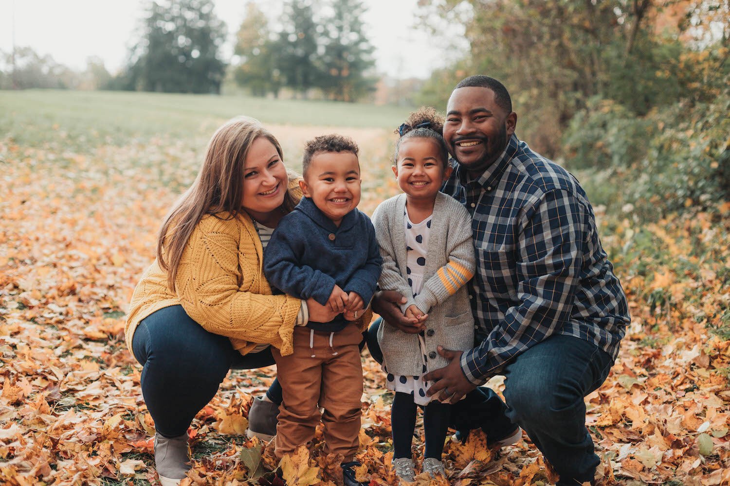 Gregg Smith-Causey, right, and his family.