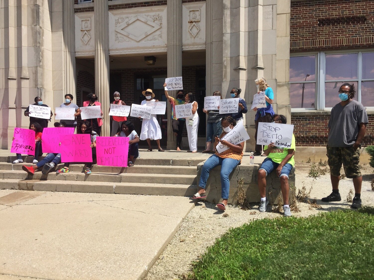 Protesters would like the neighborhood to have a say in how Ward School is repurposed.